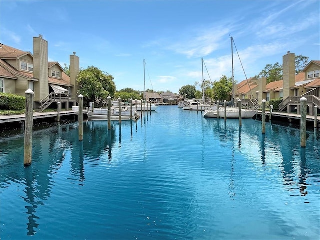 60 Chamale Cv Unit 60, Slidell, LA 70460 - view of pool featuring a boat dock and a water view