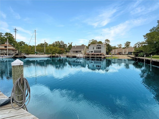 60 Chamale Cv Unit 60, Slidell, LA 70460 - view of swimming pool featuring a water view and a dock
