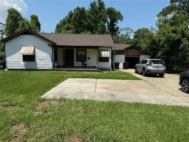 5013 Douglas Ave, Baton Rouge, LA 70805 - single story home featuring a front yard, covered porch, a shingled roof, an attached garage, and driveway