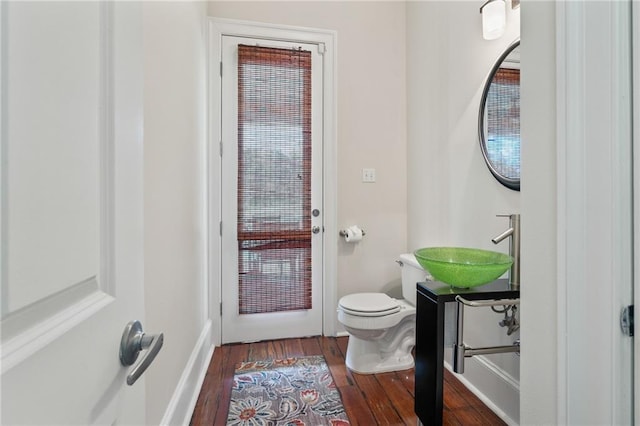 22484 Treadaway St, Mandeville, LA 70471 - bathroom featuring wood finished floors and vanity