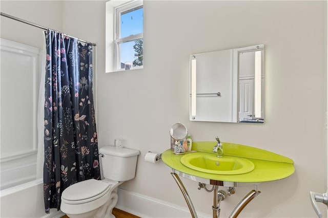 22484 Treadaway St, Mandeville, LA 70471 - full bathroom featuring toilet and shower / bath combination with curtain