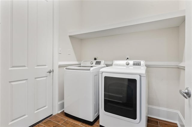 22484 Treadaway St, Mandeville, LA 70471 - laundry area featuring independent washer and dryer and wood tiled floors