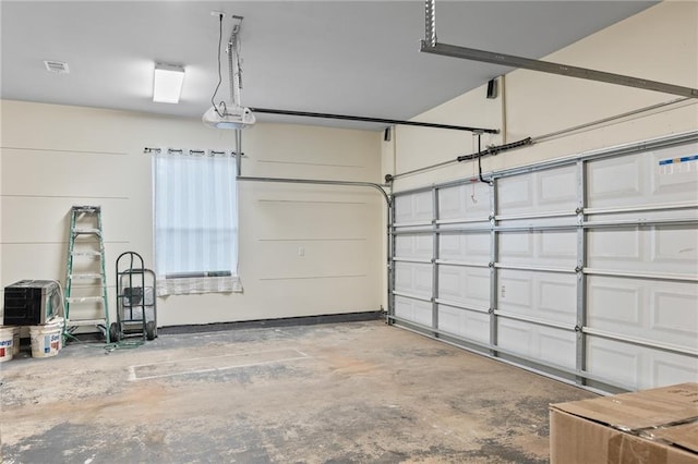 22484 Treadaway St, Mandeville, LA 70471 - garage featuring a garage door opener