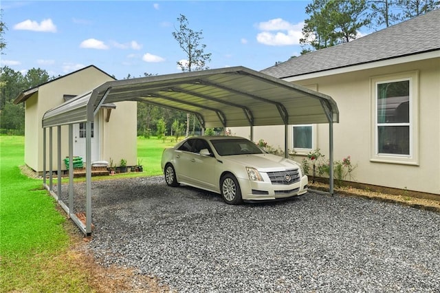 22484 Treadaway St, Mandeville, LA 70471 - view of car parking featuring a detached carport and gravel driveway