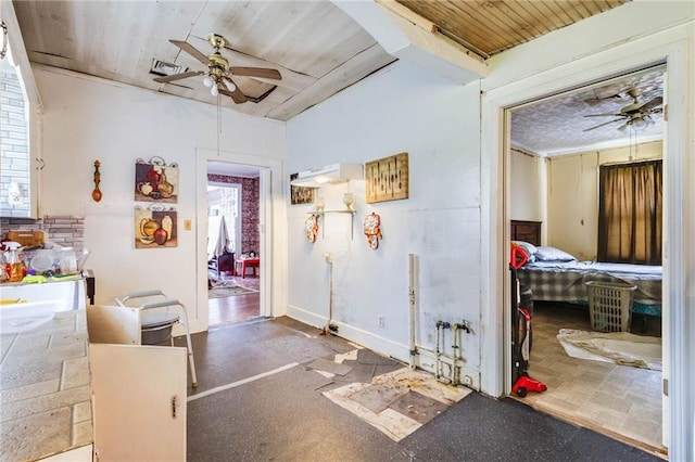 719 W Vine St, Opelousas, LA 70570 - hallway with healthy amount of natural light and wood ceiling