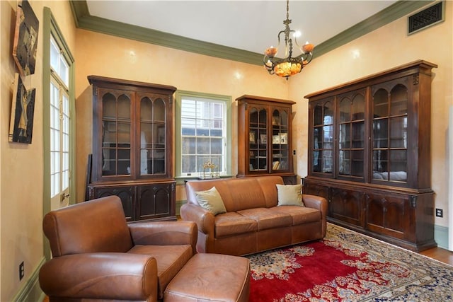101921 Saint Peter St, New Orleans, LA 70116 - living area with a chandelier and crown molding