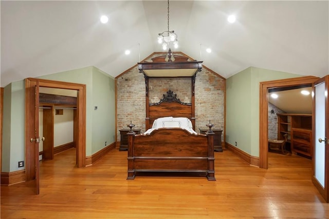 101921 Saint Peter St, New Orleans, LA 70116 - bedroom with vaulted ceiling and light wood finished floors