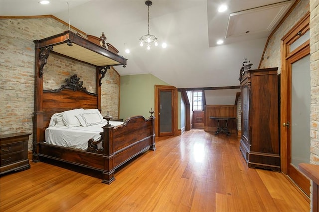 101921 Saint Peter St, New Orleans, LA 70116 - bedroom with light wood-style floors, vaulted ceiling, and recessed lighting