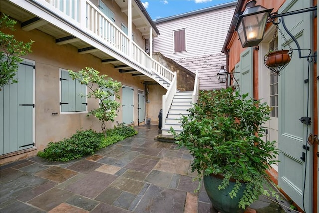 101921 Saint Peter St, New Orleans, LA 70116 - view of patio / terrace with stairway