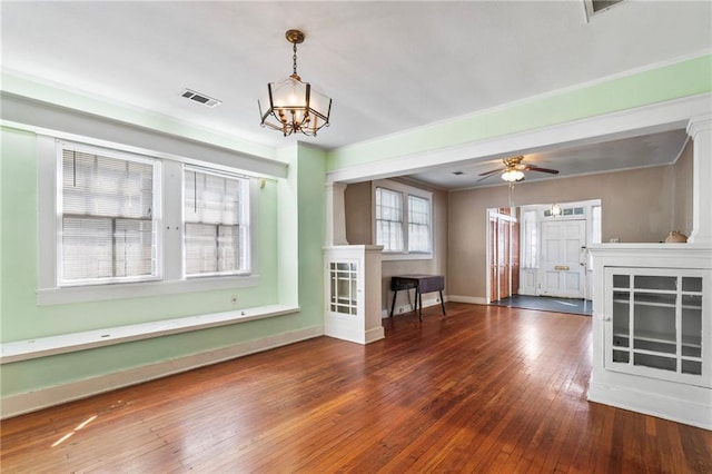 1316 Lowerline St, New Orleans, LA 70118 - unfurnished living room featuring hardwood / wood-style flooring, a chandelier, a ceiling fan, and ornamental molding
