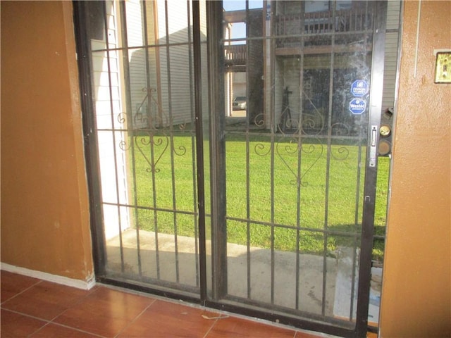 2101 Westbend Pkwy Unit 249, New Orleans, LA 70114 - entryway with baseboards and tile patterned floors