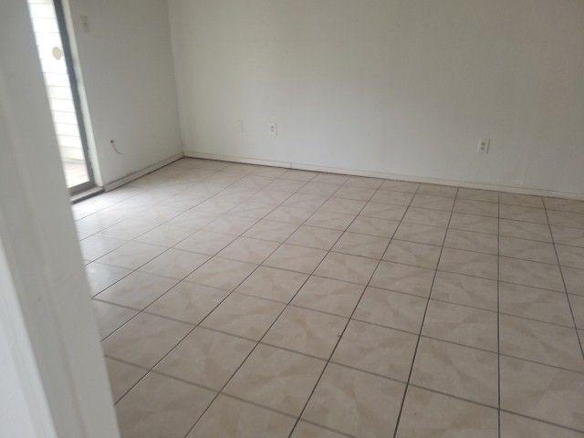 2101 Westbend Pkwy Unit 249, New Orleans, LA 70114 - spare room with baseboards and light tile patterned flooring