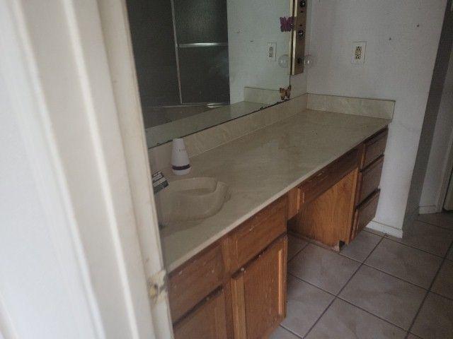 2101 Westbend Pkwy Unit 249, New Orleans, LA 70114 - bathroom featuring vanity and tile patterned flooring