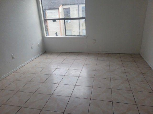 2101 Westbend Pkwy Unit 249, New Orleans, LA 70114 - empty room with light tile patterned flooring