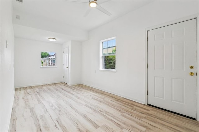 1621 Congress St, New Orleans, LA 70117 - unfurnished room with healthy amount of natural light, ceiling fan, and wood finished floors