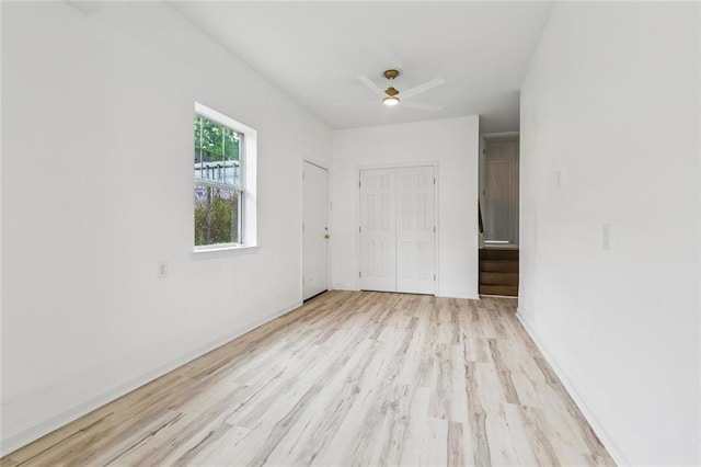 1621 Congress St, New Orleans, LA 70117 - spare room with light wood-style flooring and a ceiling fan