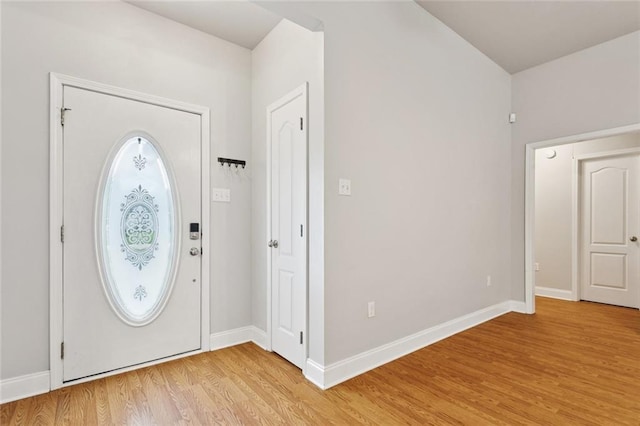 41151 Snowball Cir, Ponchatoula, LA 70454 - foyer featuring baseboards and light wood-type flooring