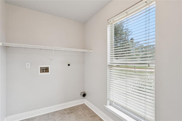 41151 Snowball Cir, Ponchatoula, LA 70454 - washroom with hookup for an electric dryer, washer hookup, healthy amount of natural light, and tile patterned flooring