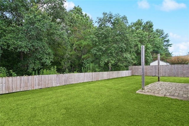 41151 Snowball Cir, Ponchatoula, LA 70454 - fenced backyard featuring a patio