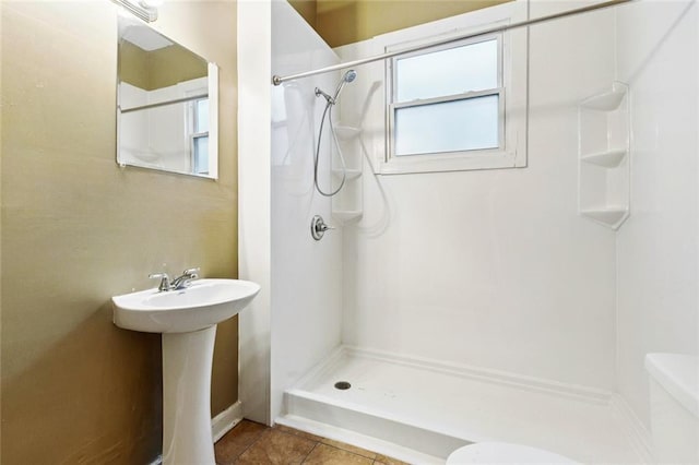 264951 Bruxelles St, New Orleans, LA 70119 - bathroom with a shower and tile patterned flooring