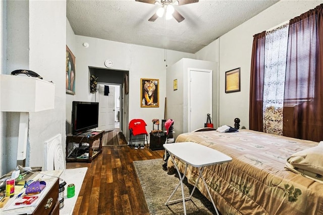 264951 Bruxelles St, New Orleans, LA 70119 - bedroom featuring hardwood / wood-style flooring, a textured ceiling, and ceiling fan