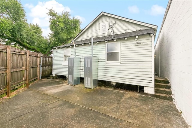 264951 Bruxelles St, New Orleans, LA 70119 - back of property featuring a shingled roof