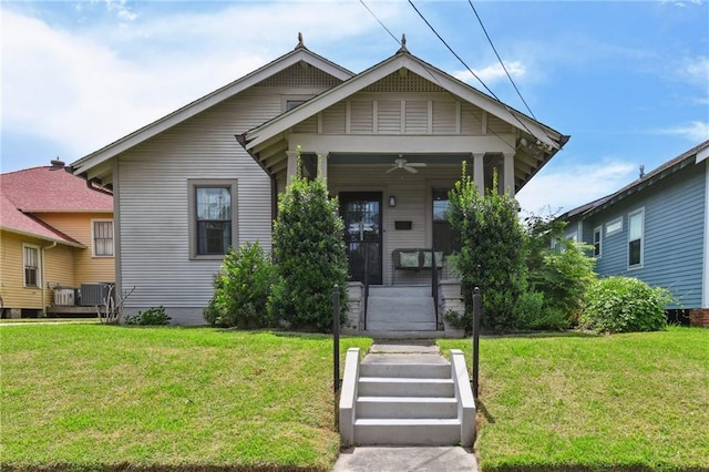 4472 Demontluzin St, New Orleans, LA 70122 - view of front of home featuring a porch, a front yard, and a ceiling fan