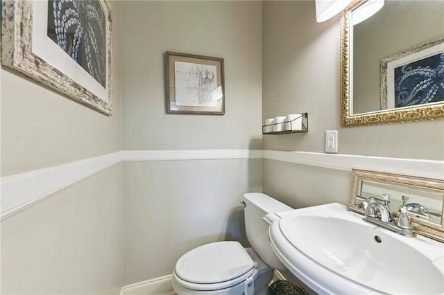 4472 Demontluzin St, New Orleans, LA 70122 - bathroom featuring a sink and toilet