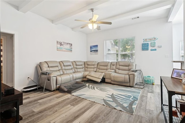 1383 Cherry St, Slidell, LA 70460 - living area with beamed ceiling, wood finished floors, and a ceiling fan