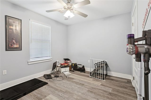 1383 Cherry St, Slidell, LA 70460 - workout area with wood finished floors, ceiling fan, and healthy amount of natural light