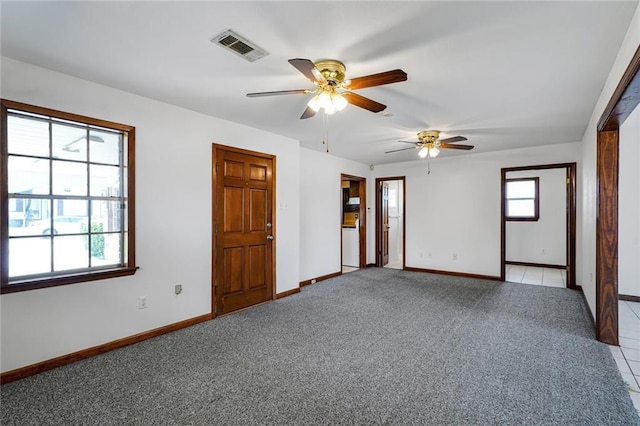 15 Tulip Dr, Gretna, LA 70053 - empty room featuring light colored carpet and ceiling fan