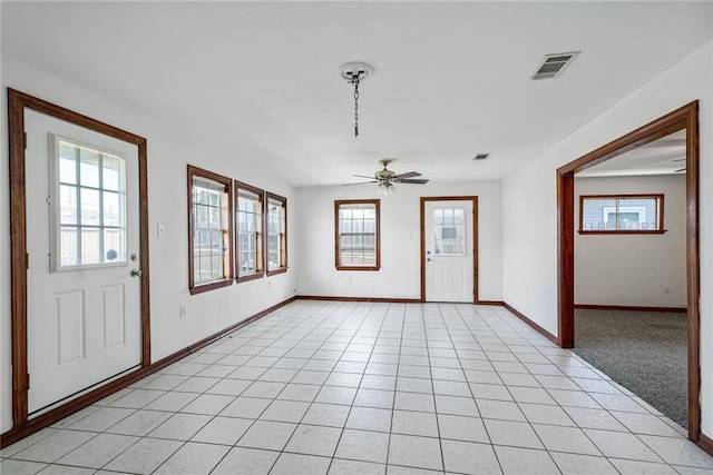 15 Tulip Dr, Gretna, LA 70053 - entrance foyer featuring plenty of natural light and ceiling fan