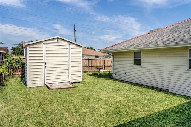 15 Tulip Dr, Gretna, LA 70053 - view of shed with a fenced backyard