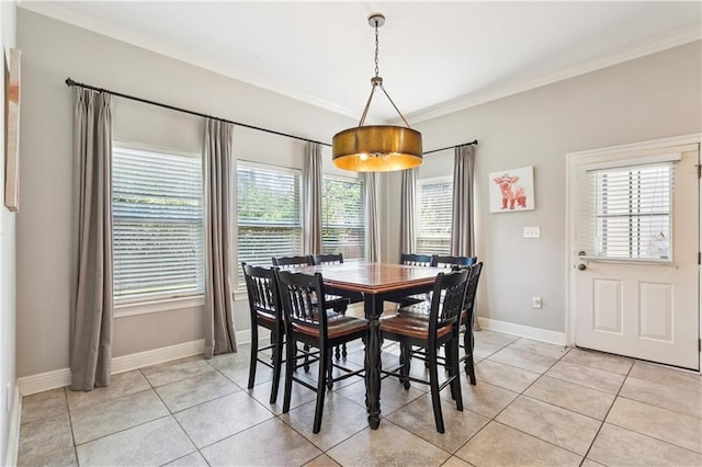 24 Minter Dr, Mandeville, LA 70471 - dining area with healthy amount of natural light, light tile patterned floors, and crown molding