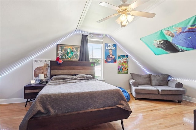 24 Minter Dr, Mandeville, LA 70471 - bedroom with wood finished floors, vaulted ceiling, and ceiling fan