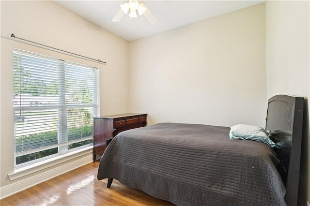 24 Minter Dr, Mandeville, LA 70471 - bedroom featuring wood finished floors and ceiling fan