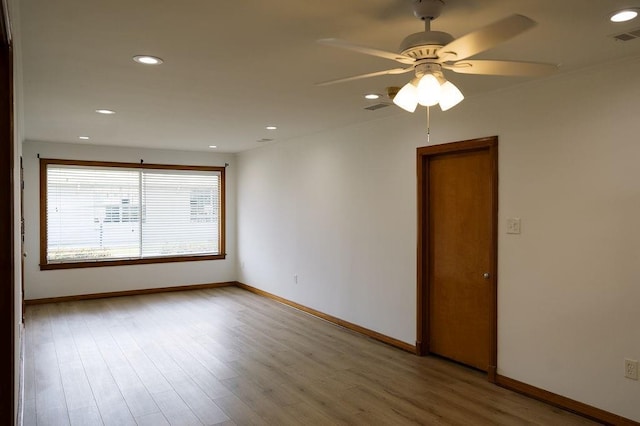 6 Gelbke Dr, Gretna, LA 70053 - unfurnished room with ceiling fan, recessed lighting, and wood finished floors