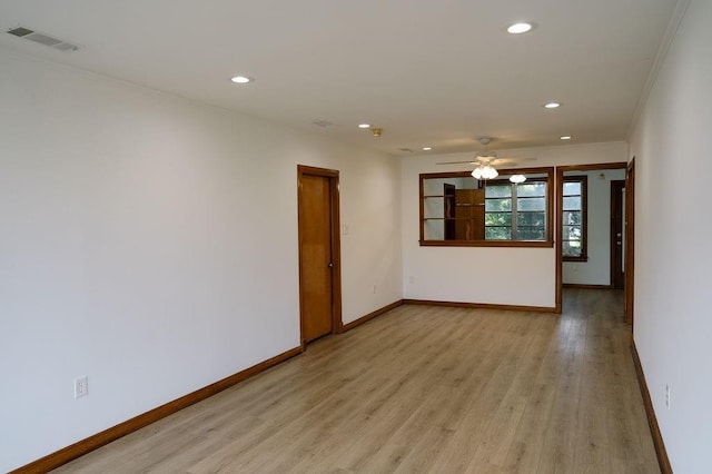 6 Gelbke Dr, Gretna, LA 70053 - spare room with recessed lighting, crown molding, light wood-style flooring, and ceiling fan