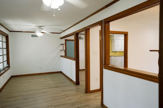 6 Gelbke Dr, Gretna, LA 70053 - empty room featuring ceiling fan, crown molding, and light wood-type flooring
