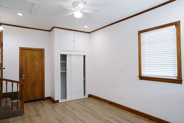 6 Gelbke Dr, Gretna, LA 70053 - unfurnished bedroom featuring light wood finished floors, crown molding, a closet, and recessed lighting