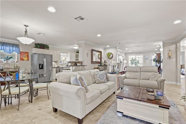 4412 Clearlake Dr, Metairie, LA 70006 - living area with ornamental molding and recessed lighting