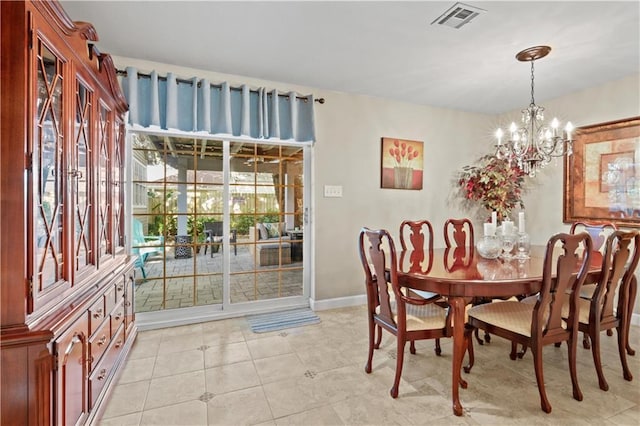4412 Clearlake Dr, Metairie, LA 70006 - dining area featuring a chandelier and light tile patterned floors