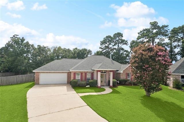 101 Tammy Dr, Slidell, LA 70458 - view of front facade featuring concrete driveway, a garage, and brick siding