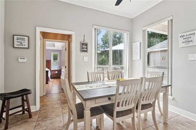 101 Tammy Dr, Slidell, LA 70458 - dining room featuring crown molding, ceiling fan, and light tile patterned floors