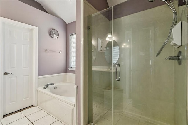 101 Tammy Dr, Slidell, LA 70458 - bathroom with tile patterned flooring, a shower stall, a garden tub, and vaulted ceiling