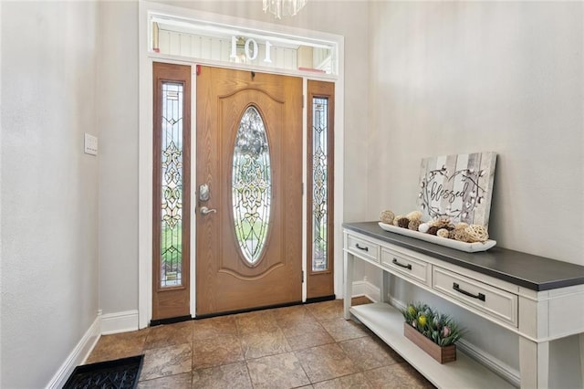 101 Tammy Dr, Slidell, LA 70458 - foyer entrance featuring baseboards and stone finish flooring