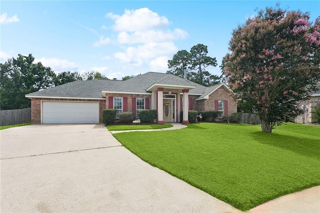 101 Tammy Dr, Slidell, LA 70458 - view of front of home with an attached garage, concrete driveway, and brick siding