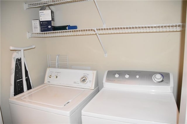350 Emerald Forrest Blvd Unit 24103, Covington, LA 70433 - laundry area with washer and clothes dryer