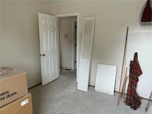 4317 James Dr, Metairie, LA 70003 - bedroom featuring unfinished concrete floors