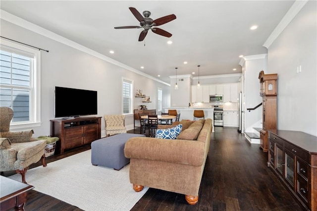 2909 Amelia St, New Orleans, LA 70115 - living area with ornamental molding, a ceiling fan, dark wood-style floors, and recessed lighting